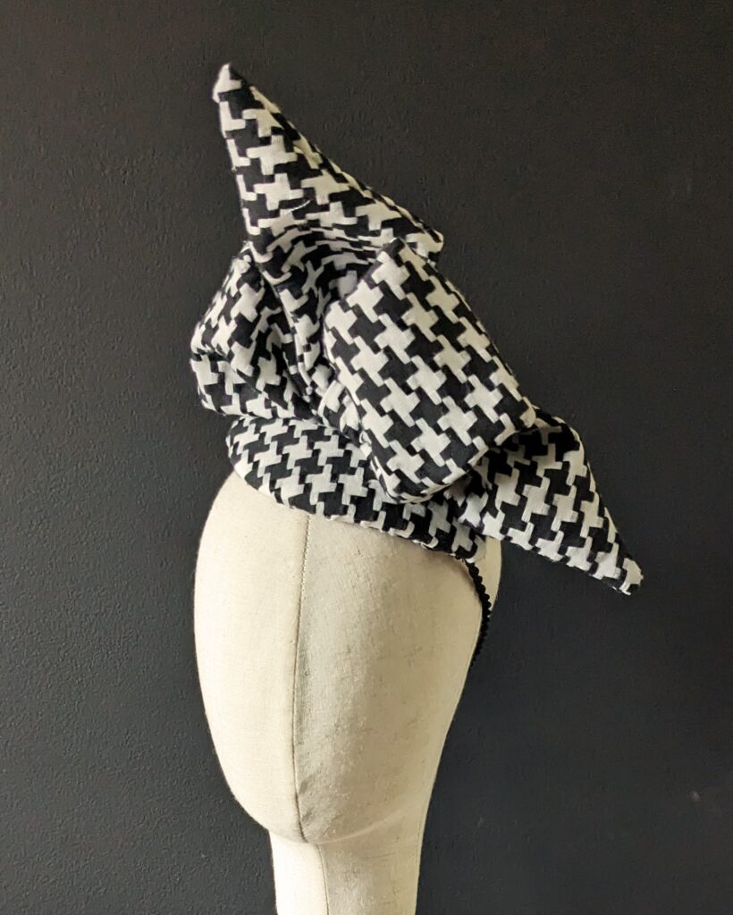Black & white bow cocktail hat. $40